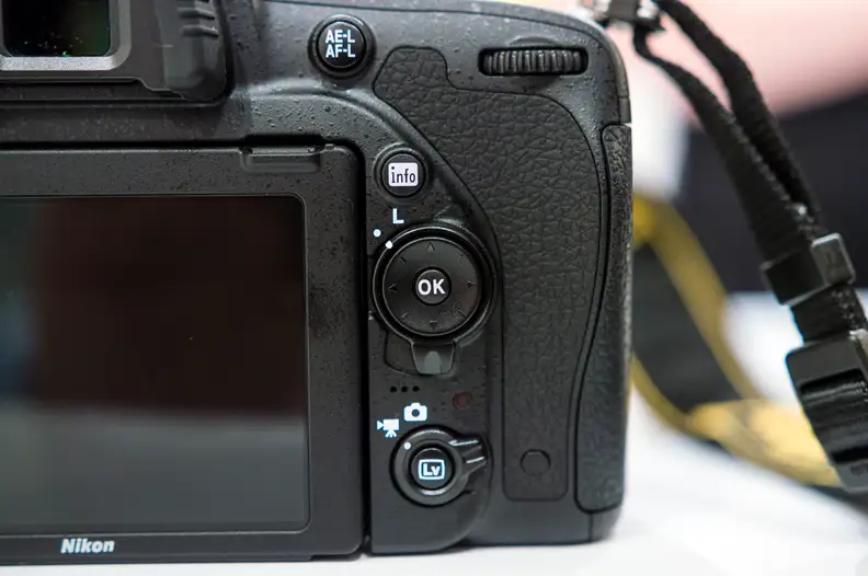 Live mode, directional pad, and other important controls are to the right of the LCD.