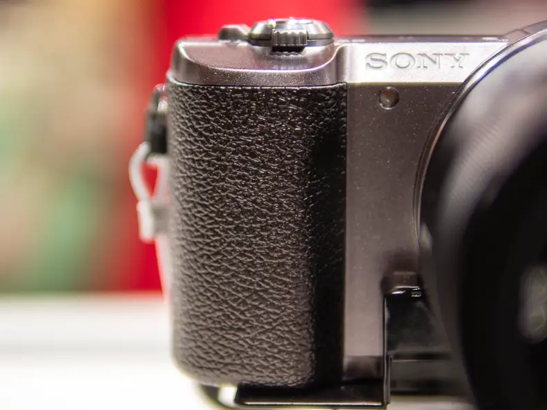 The grip on the A5100 is a bit lacking, but the small size of the camera itself helps.