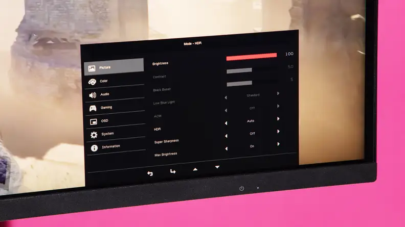 A zoomed in view of the right corner of the Acer Nitro XV275K (P3biipruzx) featuring settings menu on the screen.