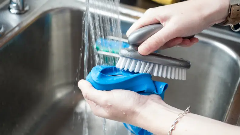 Scrub the lining of your reusable water bottle