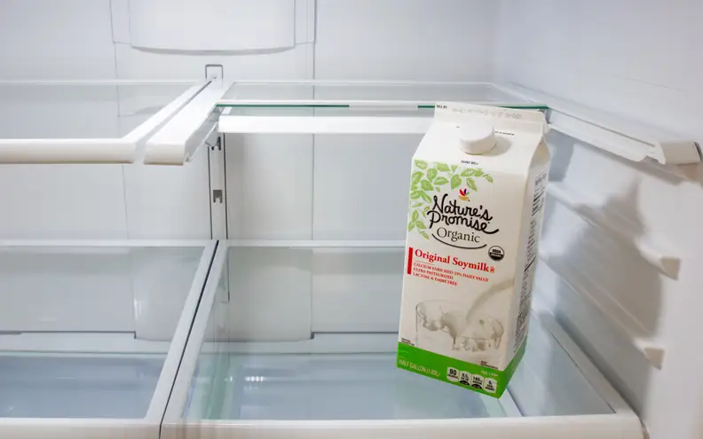 One of the shelves retracts to make room for tall containers