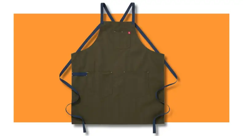 Hedley & Bennett apron on orange background