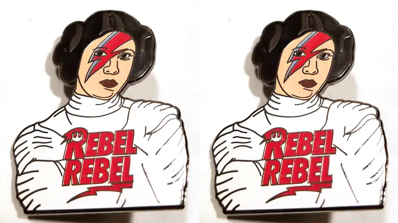 Pin with Princess Leia with David Bowie lightning makeup.