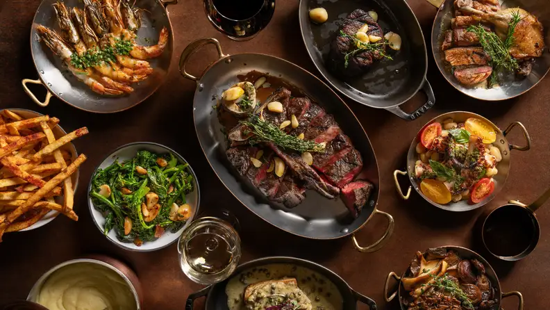 Overlooking a tableful of food on plates