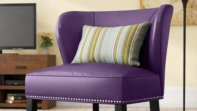 Purple leather chair in living room.