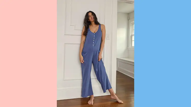 A woman posing in Hatch wear.