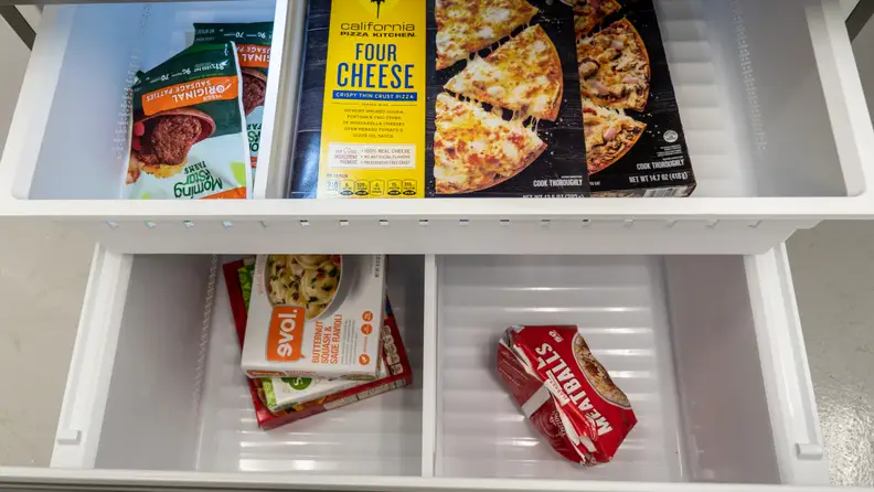 A close-up of the freezer drawer, which has two compartments in its lower level and a separate, internal drawer above that.