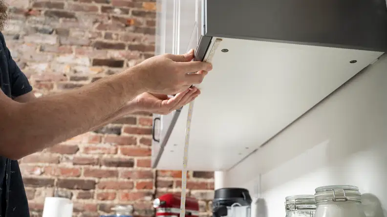 Installing strip lights under kitchen cabinet