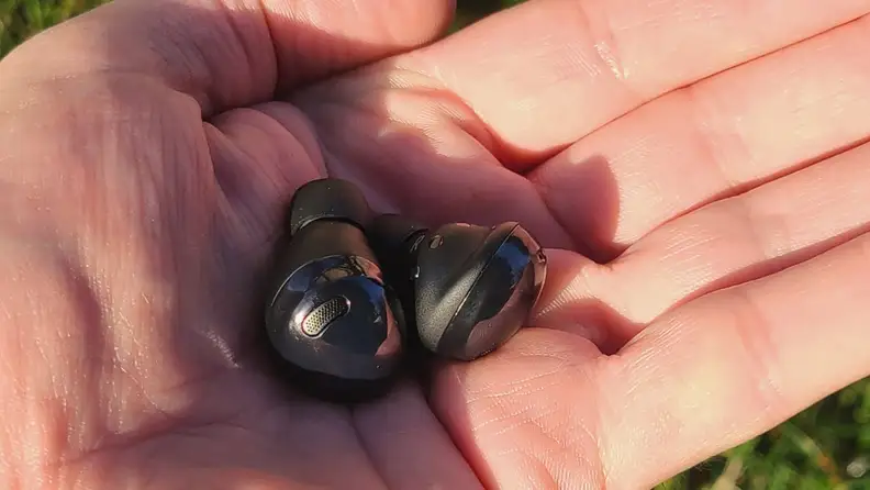 Small black earbuds