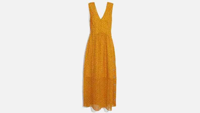 A stunning yellow dress, dotted with orange flowers.