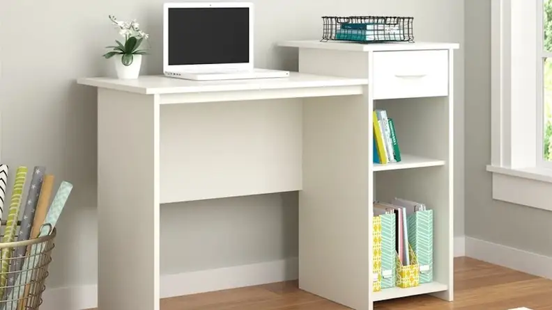 You can store a computer tower or paperwork in the side cabinet.