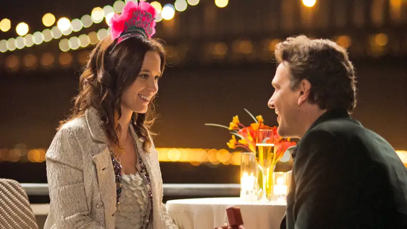 Jason Segel proposes to Emily Blunt in the 2012 romantic comedy The Five-Year Engagement.