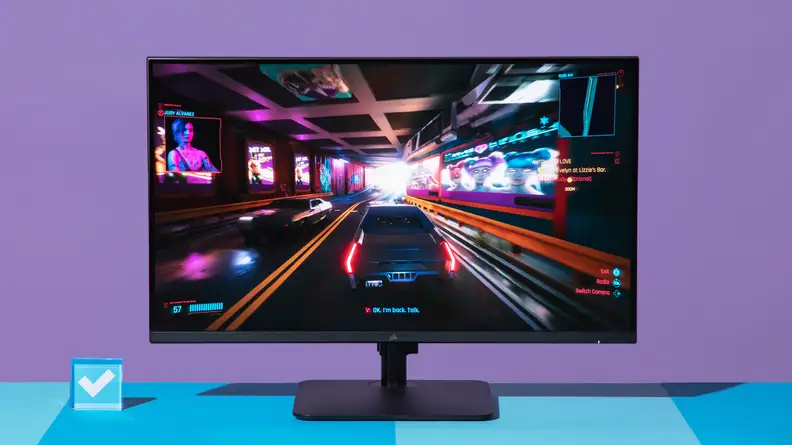 The monitor displaying Cyberpunk 2077.