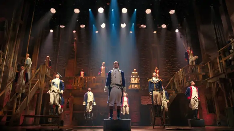 A still from Hamilton featuring most of the cast.