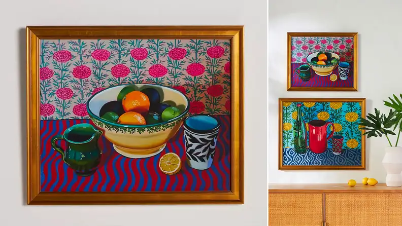 Close up of framed still life painting of fruit.