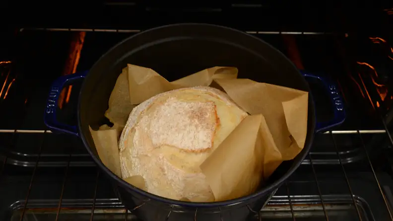 Remove the Dutch oven lid after baking for half an hour.