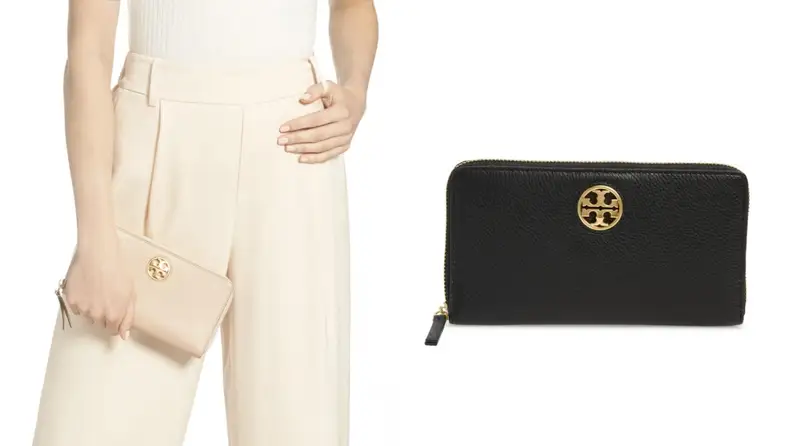 On left, woman wearing all white outfit while holding the cream Tory Burch Carson Zip Leather Continental Wallet. On right, product shot of the black Tory Burch Carson Zip Leather Continental Wallet.