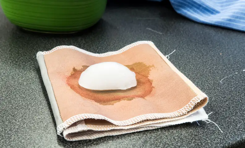 An ice cube working its magic on a blood stain patch we use for washer testing.