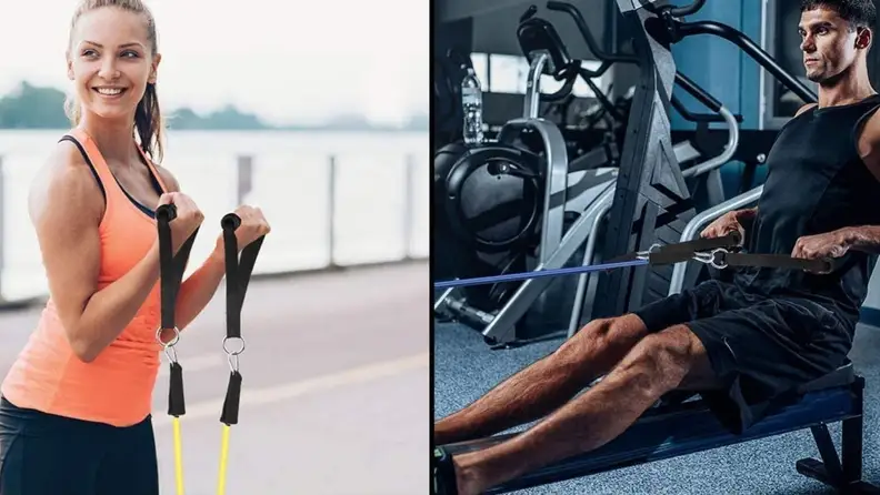 A woman working out using resistance bands.