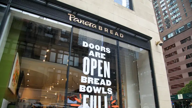 The window of an urban Panera Bread
