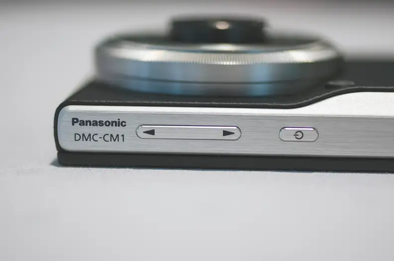 Here are the volume and power button, which are located on the top end of the camera.