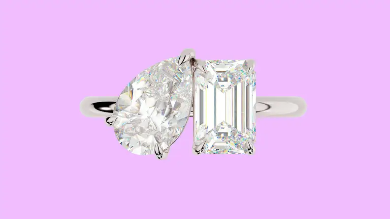 Photo of the East West Gem Co. The Shae Ring against a purple background.