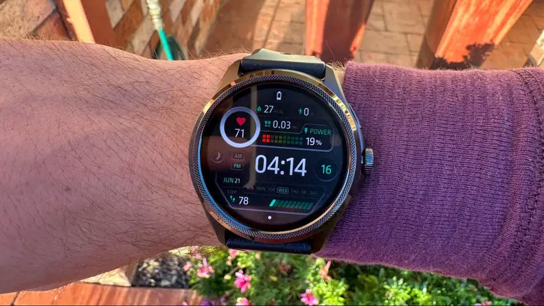 The Ticwatch Pro 5 being worn by our tester. The face of the watch's digital display is being featured.