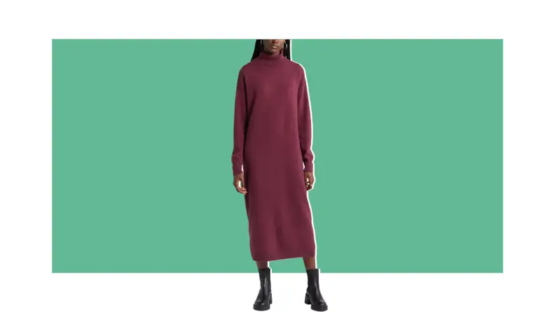 A long burgundy turtleneck sweater dress.