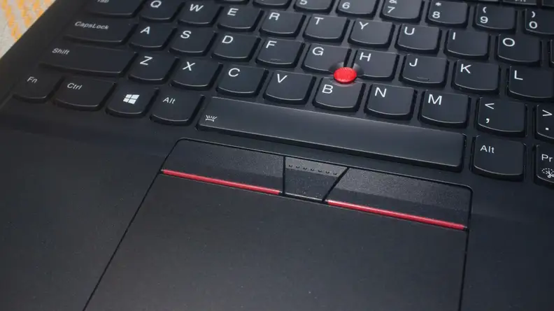 A close-up of the ThinkPad E14's keyboard, trackpad, and trackpoint.