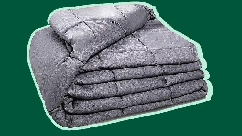Weighted blanket on a green background