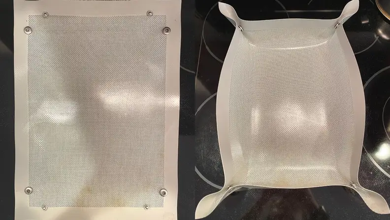 On left, clean baking mat laying flat, shot from above. On right, clean baking mat folded into a tray, shot from above.