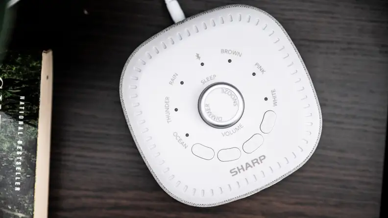 the top of the sharp alarm with a knob