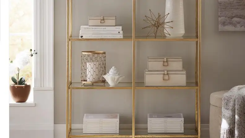An Eliza aged gold bookcase