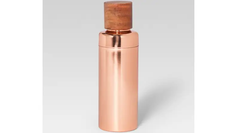 A rose gold cocktail shaker