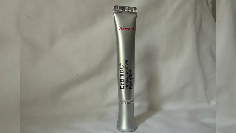 Dr. Brid C Moisturizer against a grey background.