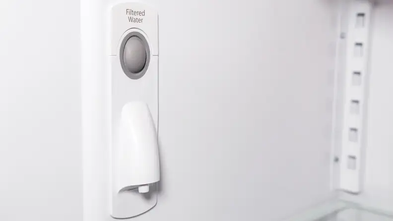 The KitchenAid KRFC300ESS refrigerator has an internal water dispenser