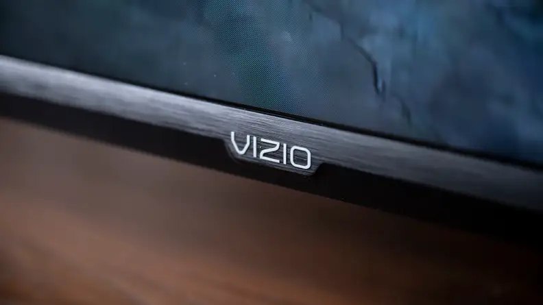 A close-up of the Vizio insignia found on the front of the 2021/2022 Vizio V-Series