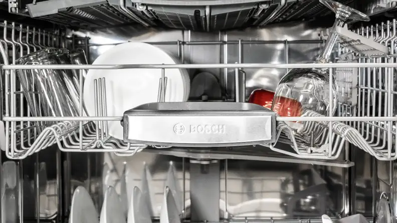 A close-up of the Bosch logo on the middle rack of the 800 Series SHP78CM5N dishwasher.