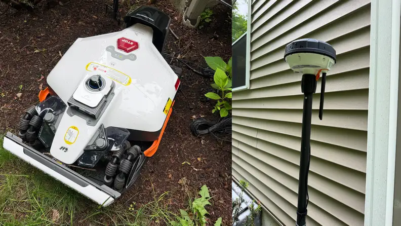 A robot lawn mower in the garden and an RTK antenna