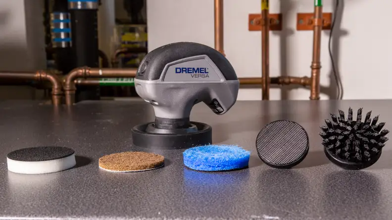 Starting from the right: melamine eraser, heavy-duty scrub, scratch-free scrub, cleaning head, and bristles.