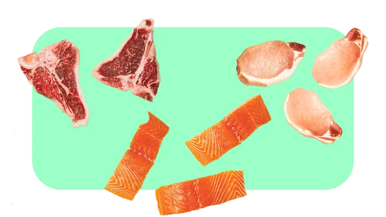 Raw t-bone steaks, salmon pieces, and pork chops.