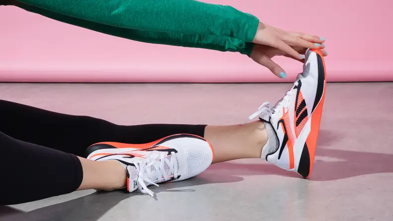 Woman stretching out in Nano X4s.