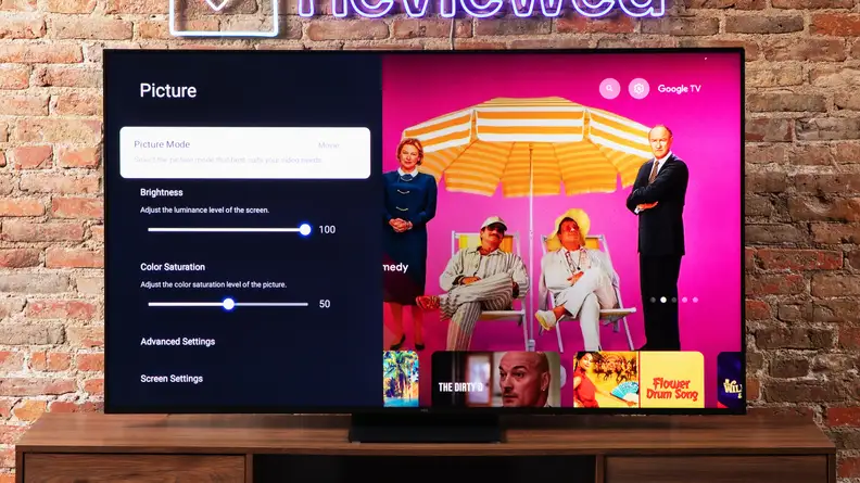 A TCL QM8 LED TV showing a setting screens with a vibrant picture.