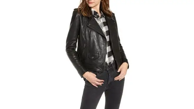 Woman in black leather jacket