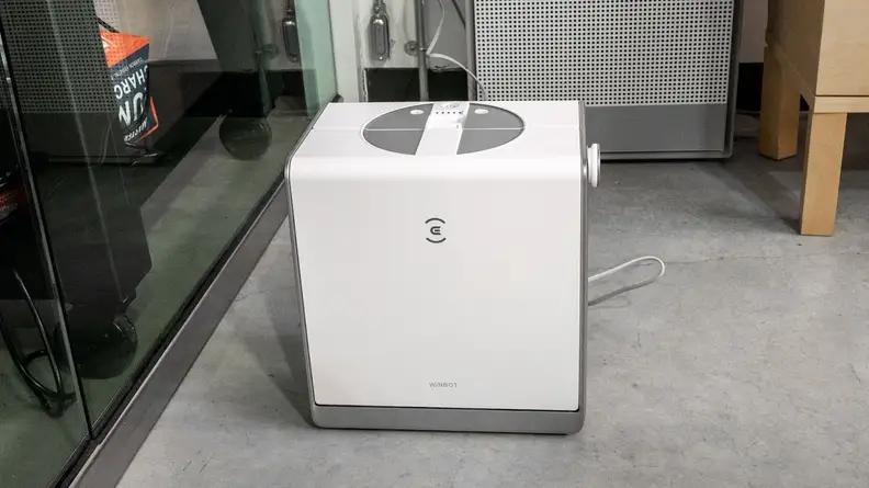 The Ecovacs Winbot W2 Omni in its carrying case