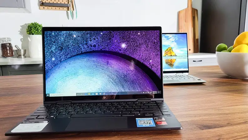 Close up of a laptop on a table.