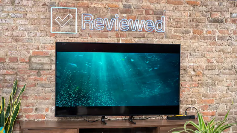 The Samsung Q70A displaying 4K/HDR content in a living room setting