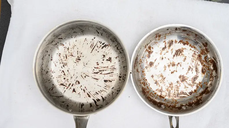 The pot with the tomato sauce stain (left) and the skillet with the brownie stain (right) soaked for 3 hours, and were then lightly hand-scrubbed.