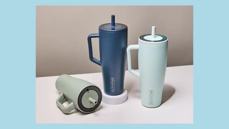 insulated cups on blue background