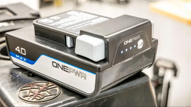 A Onepwr on a ladder displaying its power level